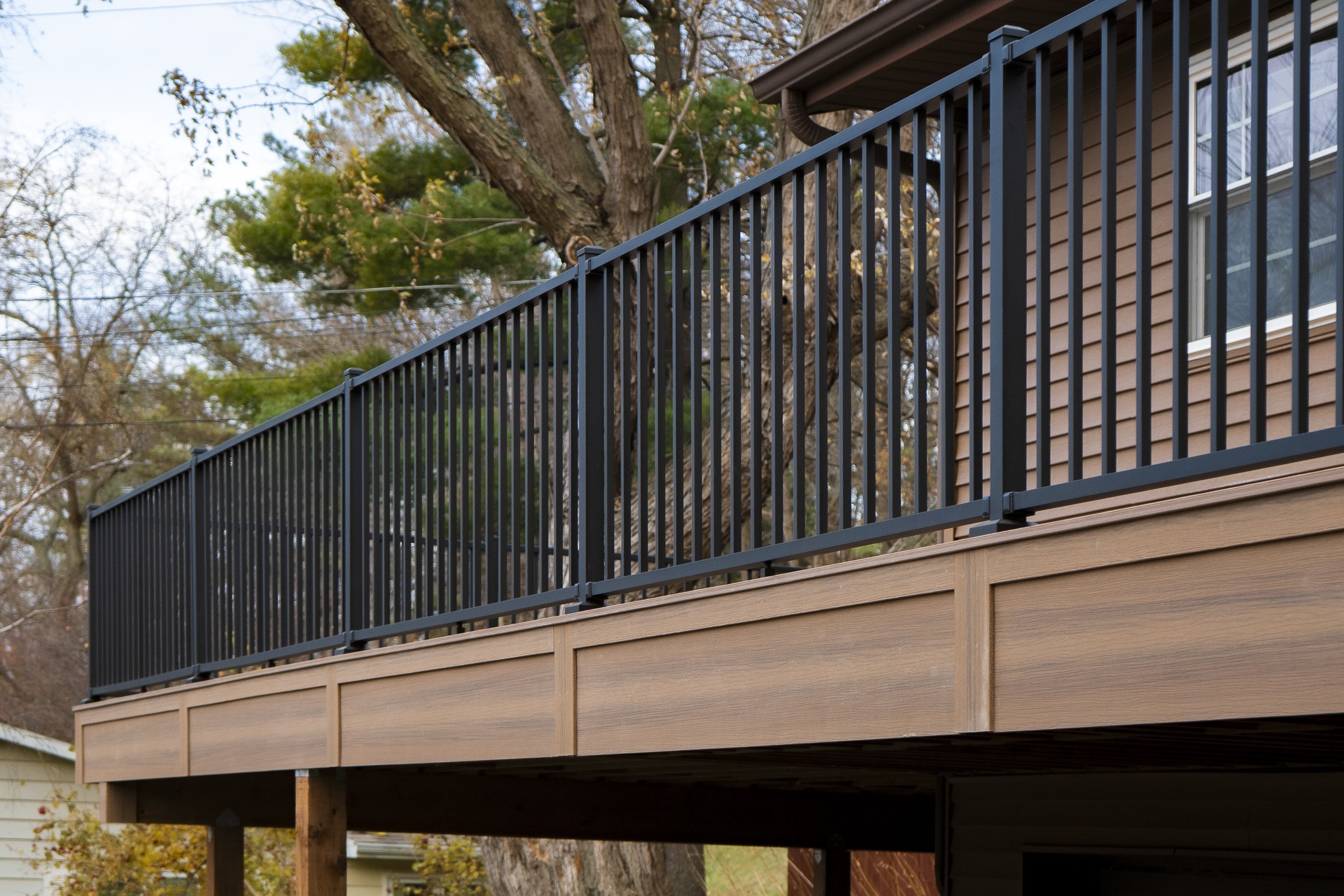 Raised deck with black metal railing