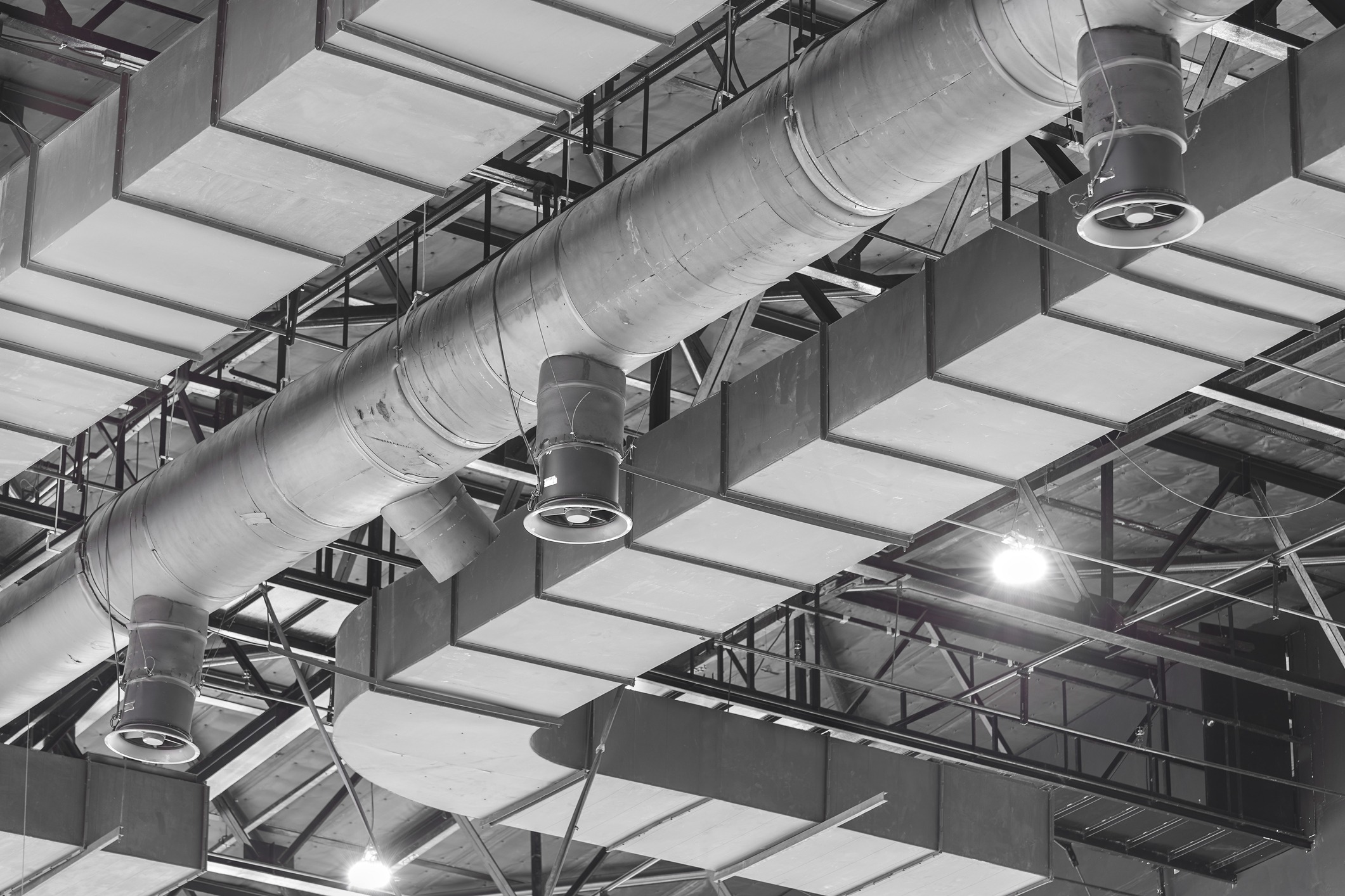 Industrial ceiling with large HVAC ducts and vents