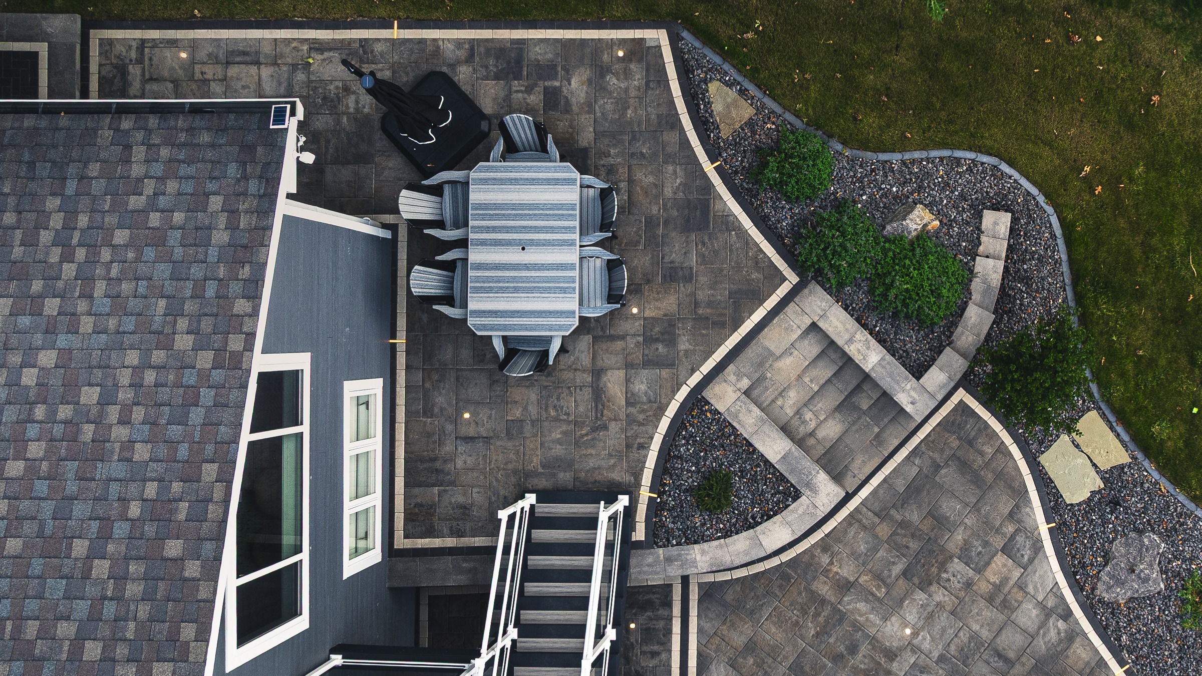 Aerial view of backyard patio and landscaping