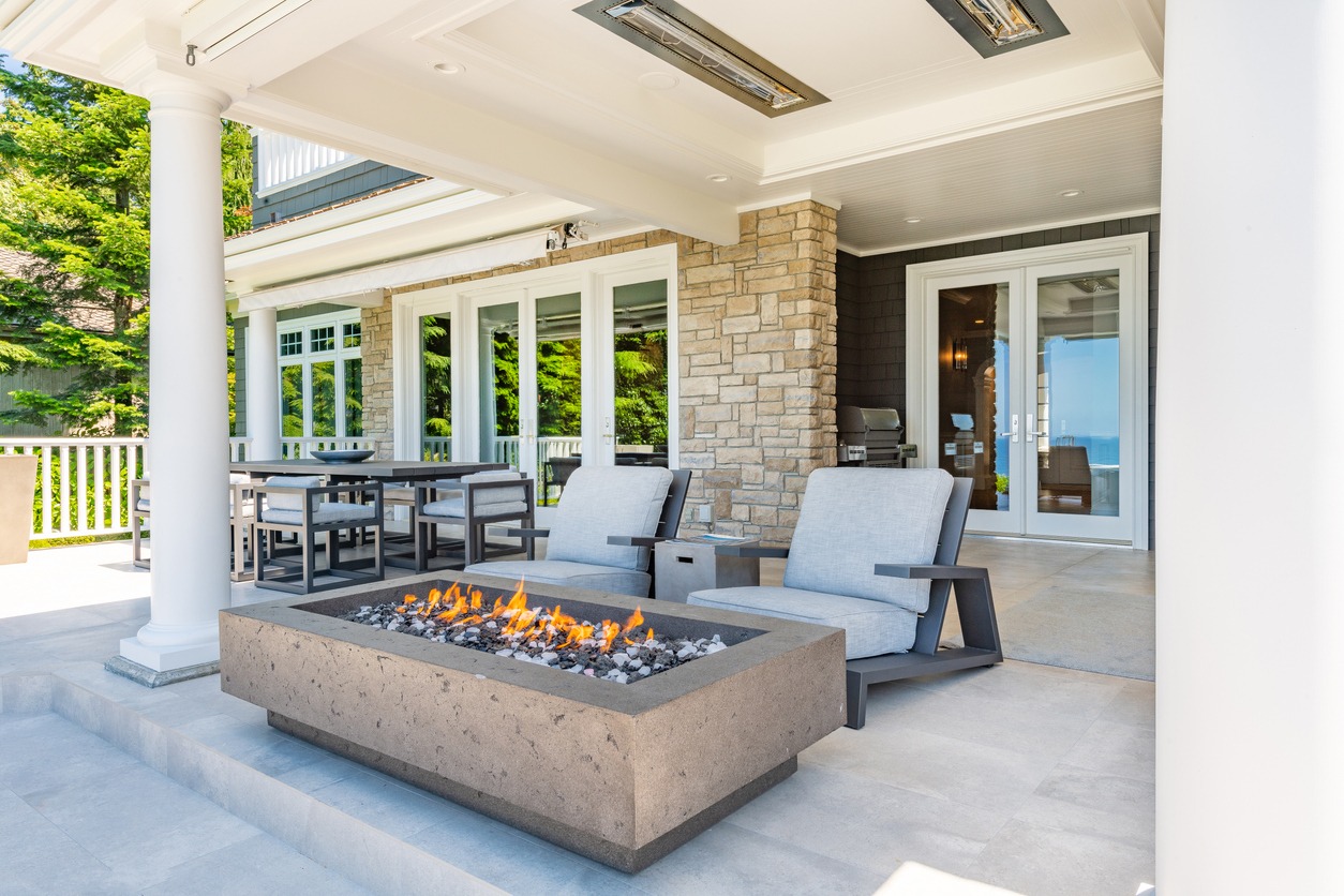 Modern covered patio with fire pit and seating