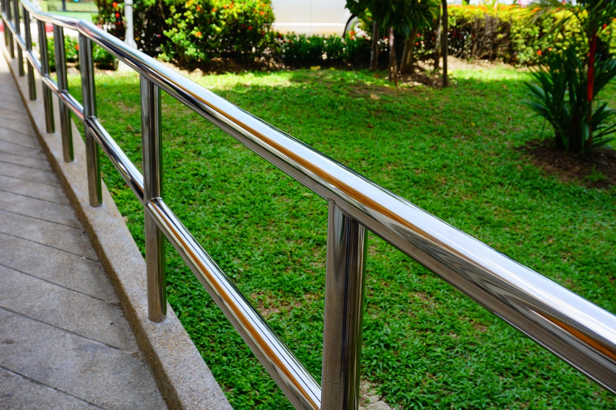 Stainless steel handrail along outdoor walkway