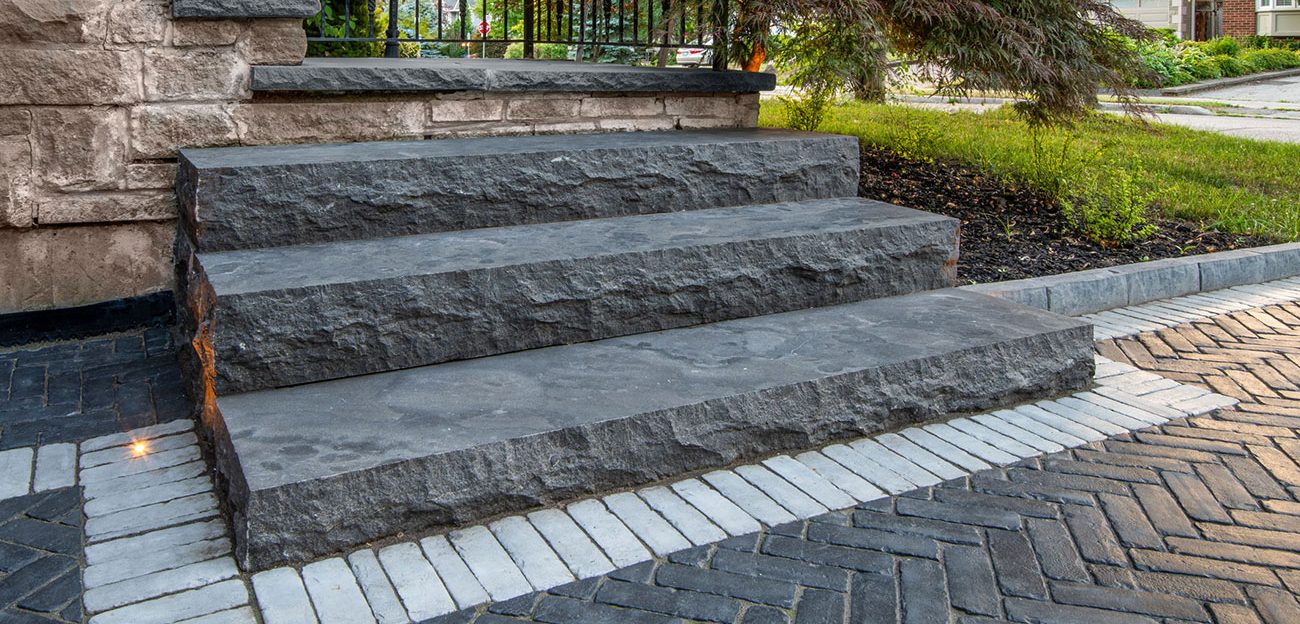 Stone front steps with brick paver walkway